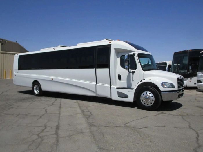 Large white party bus – Longmont limo service