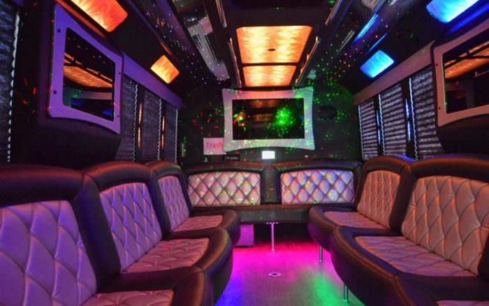 Party bus lounge with LED ceiling – Longmont limo service